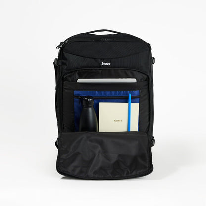 Swae Flow 40L Travel Backpack laptop compartment open – padded sleeve for secure device storage, plus a smaller zip pocket for accessories and cables.